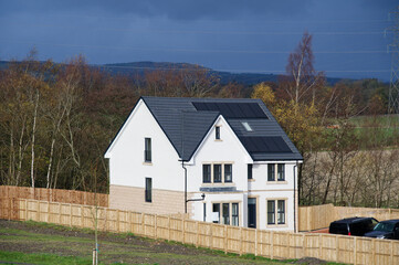 Solar panels installed on home roofs at new housing development