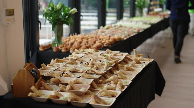 event table full of catering snacks