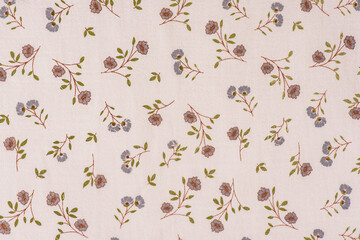 Texture of beige flower fabric. Cotton as a background
