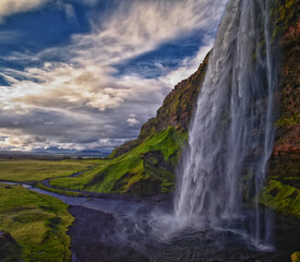 Seljalandsfoss waterfall summer 2024 at sunset including Glj&uacute;frab&uacute;i falls off Ring Road Iceland, Scandinavia, Europe.