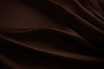 Black dark chocolate brown background. Silk satin fabric. Luxury elegant beauty premium rich. Shiny glitter silky. Drapery fold crease. Christmas birthday Valentine romance festival.