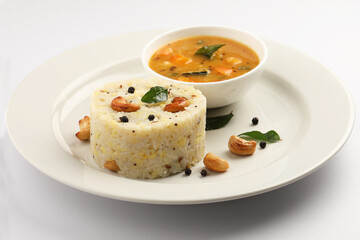 South Indian Food Ven Pongal Khara Pongal with Sambar popular breakfast food of Tamil Nadu festival Pongal Sankranti Diwali spicy pongal prepared with rice and lentil