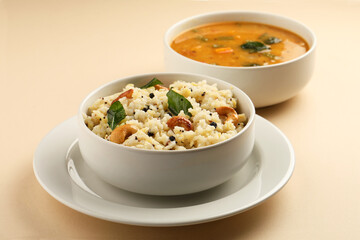 South Indian Food Ven Pongal Khara Pongal with Sambar popular breakfast food of Tamil Nadu festival Pongal Sankranti Diwali spicy pongal prepared with rice and lentil