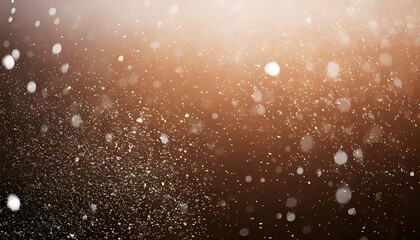 White specks are scattered across a gradient brown background, creating an abstract, textured effect of movement.