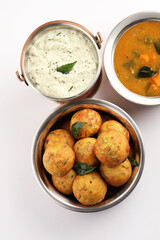 Kuzhi Paniyaram served with coconut chutney and sambar- South Indian breakfast