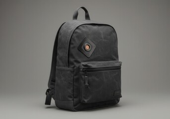 Naklejka premium Modern black backpack with smart tracking device on neutral background