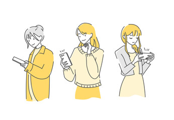 スマートフォンを見ている女性