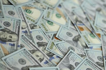 Big amount of american USD hunderd dollar bills banknotes close up