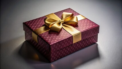 Luxurious Burgundy Gift Box with Gold Bow - Low Light Product Photography