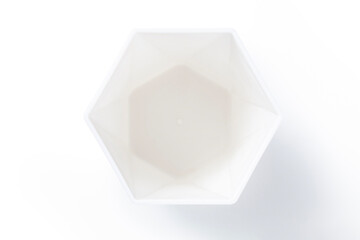 Hexagonal white plastic cup isolated on white background, Top view