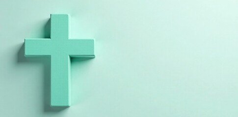 Obraz premium Mint green cross on light gray background with subtle copy space, calmness, cross