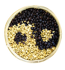 Coffee beans in the shape of a yin and yang symbol with white background