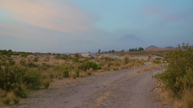 View of the Misti Volcano and the Chachani Volcano in the background at sunset, photo taken from the San Jos&eacute; de Uzu&ntilde;a Lagoon.