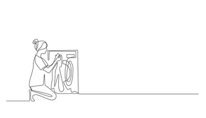 continuous line of woman washing clothes with washing machine.single line drawing of woman putting dirty clothes in washing machine.one line vector illustration