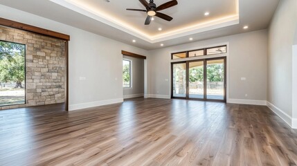 Fototapeta premium Spacious and Luxurious Modern Living Room with Hardwood Floors and Ample Natural Lighting