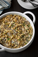Family-Style Mushroom and Beef Stroganoff Noodle Dinner with creamy sour cream sauce and minced parsley