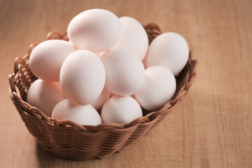 close up of eggs in a bowl.