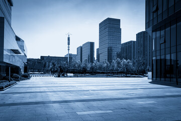 Modern Urban Landscape in Blue Tones Capturing City Life and Architecture