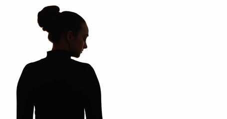Upset silhouette. Loneliness melancholy. Dark contrast back view outline of sad depressed woman isolated on white copy space background.
