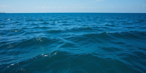 Fototapeta premium Deep blue ocean waves on a sunny day.