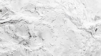 Fototapeta premium Closeup of desaturated transparent clear water surface with gentle splashes and bubbles, creating a trendy white-grey abstract background under sunlight