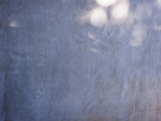 Close up blank grey concrete wall with light bokeh f