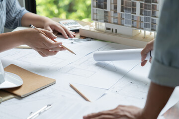 Architecture drawing on architectural Creative project business architecture building construction Industrial engineering Achievement Planning Design on blueprint Teamwork