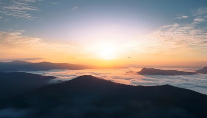 Goal of life, growth and motivation: Bright sunrise over a mountain, symbolizing new beginnings.