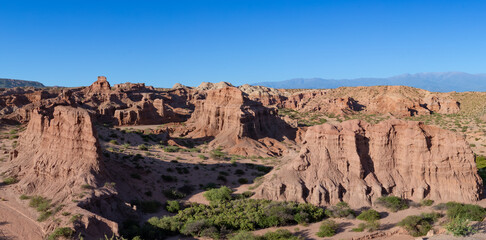 Fototapeta premium Panorama scenery looking across the dry landscapes near Cafayate, Salta Province, Argentina.