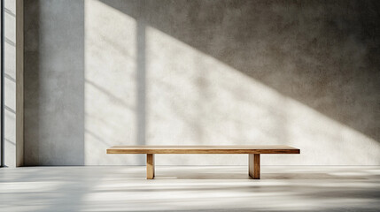 Minimalist wooden table in a spacious room with natural light in the afternoon