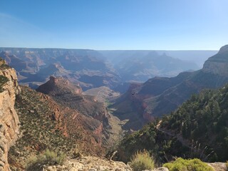 Fototapeta premium A view of the Grand Canyon on a summer morning while going down the Bright Angel trail to Havasupai Gardens