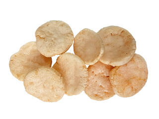 Heap of fresh baked Indonesian traditional shrimp crackers or kerupuk udang isolated on white background with clipping path. Close up top view flat lay of Krupuk Palembang.