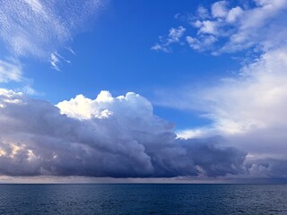 Dramatic sky big thunder clouds over the sea.