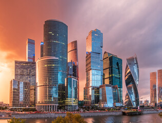 Fototapeta premium High buildings of Moscow-City at Moskva River at summer sunset, Russia.