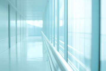 A deserted hospital hallway with blue floors, suitable for medical and healthcare concepts