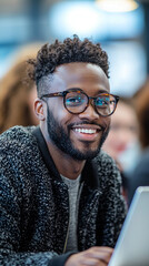 Happy Young Man with Laptop  Glasses  Smiling
