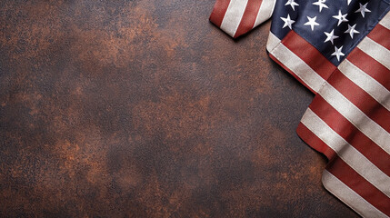 Obraz premium Patriotic American flag draped on textured brown background, symbolizing national pride and unity. Perfect for celebrating freedom and heritage