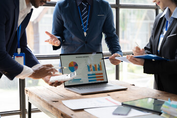 Strategic Business Meeting: Diverse Team Analyzing Data 