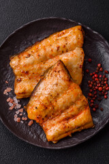 Grilled fish fillet with salt, spices and herbs