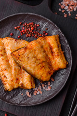 Grilled fish fillet with salt, spices and herbs