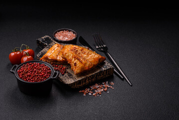 Grilled fish fillet with salt, spices and herbs