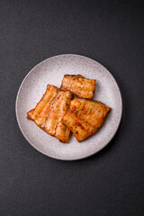 Grilled fish fillet with salt, spices and herbs
