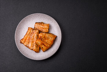 Grilled fish fillet with salt, spices and herbs