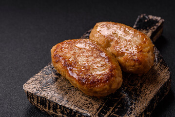 Delicious fresh fried minced fish cutlets with spices and herbs