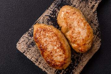 Delicious fresh fried minced fish cutlets with spices and herbs