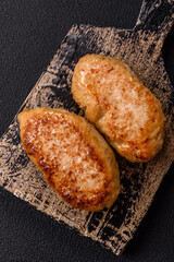 Delicious fresh fried minced fish cutlets with spices and herbs