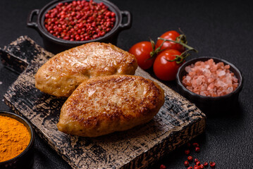 Delicious fresh fried minced fish cutlets with spices and herbs
