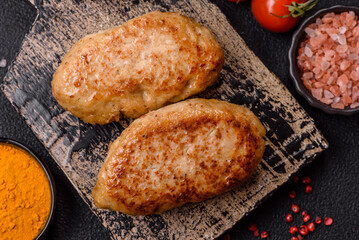 Delicious fresh fried minced fish cutlets with spices and herbs