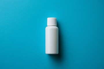 White bottle on blue background; product mockup