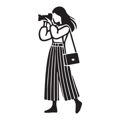 Stylish Silhouette of a Woman Photographer with a Camera